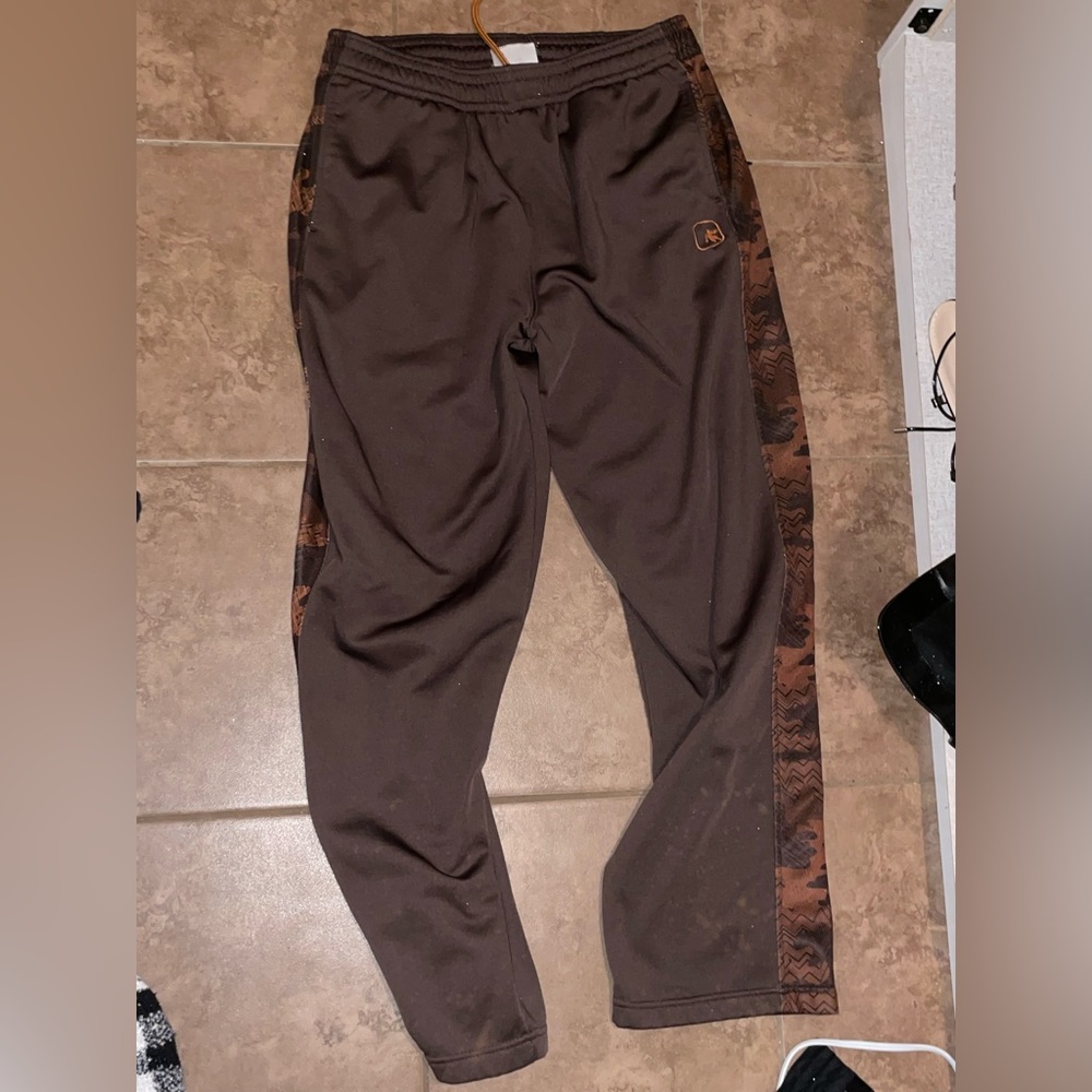 Brown and tan sweats
